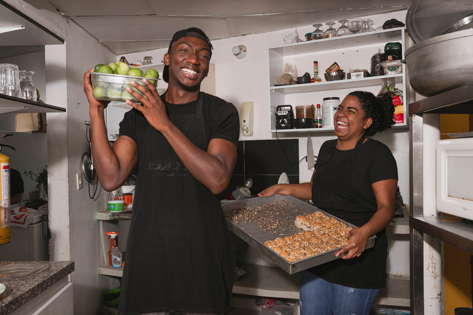 Two Happy Chefs Preparing Food in the Kitchen